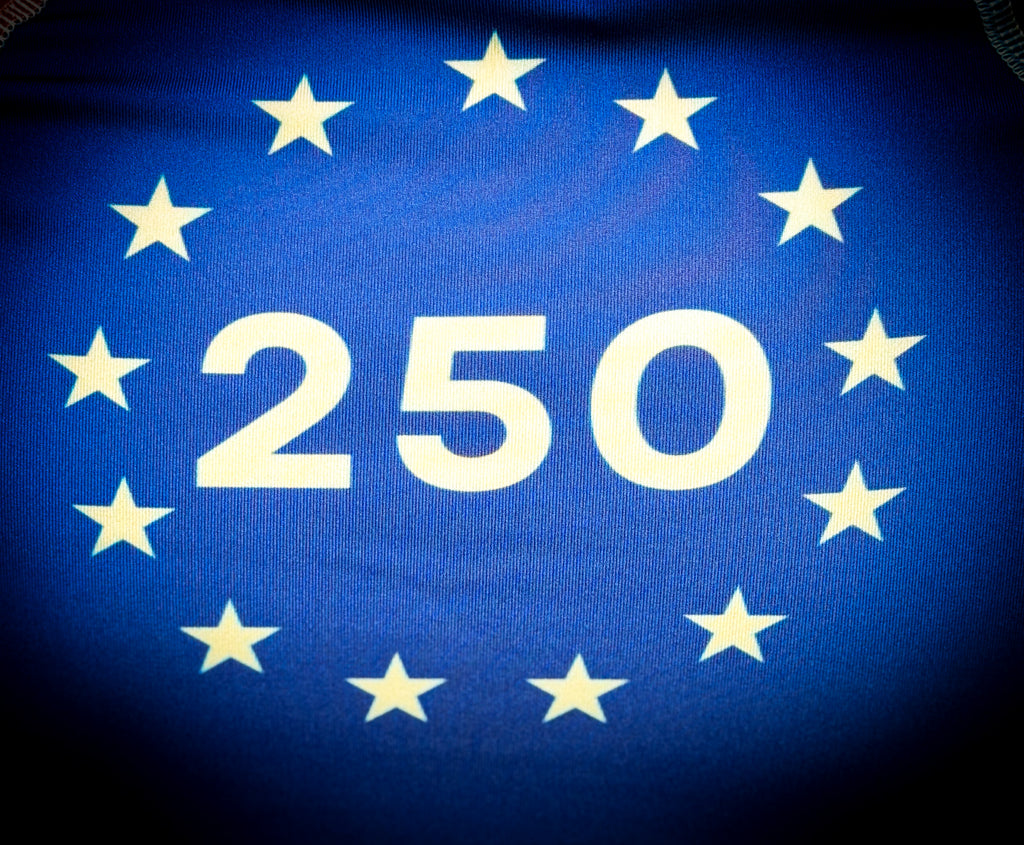 Number 250 surrounded by stars on a blue background