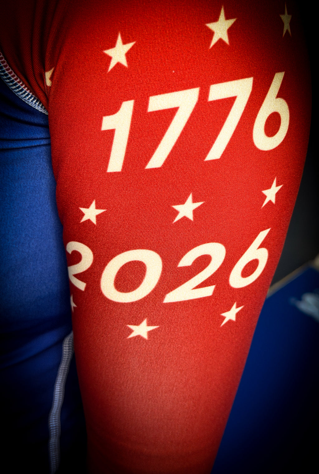 Red leg with '1776 2026' printed on it, likely representing a patriotic design.