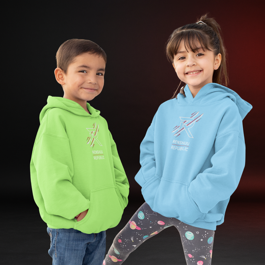Two children wearing colorful hoodies with a logo on a dark background